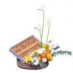 basket arragement for ramathan with oranges and flowers plus arabic sweets