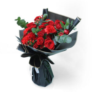 red rose bouquet with black wrap