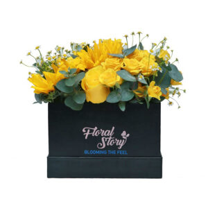 "box of flowers: flowers in square black box for celebrations"