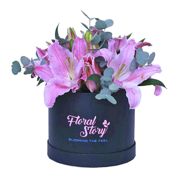 pink lilies in black box