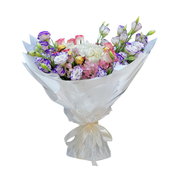 a gorgeous white bouquet of 1 purple eustoma, 2 white hydrangeas, 10 pink alstromerias, and chocolates